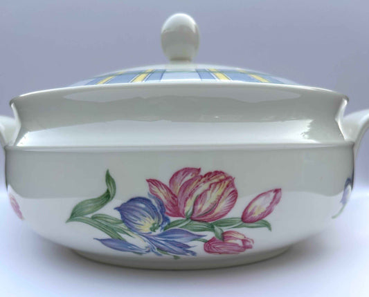 Ceramic dish with floral design on a white background