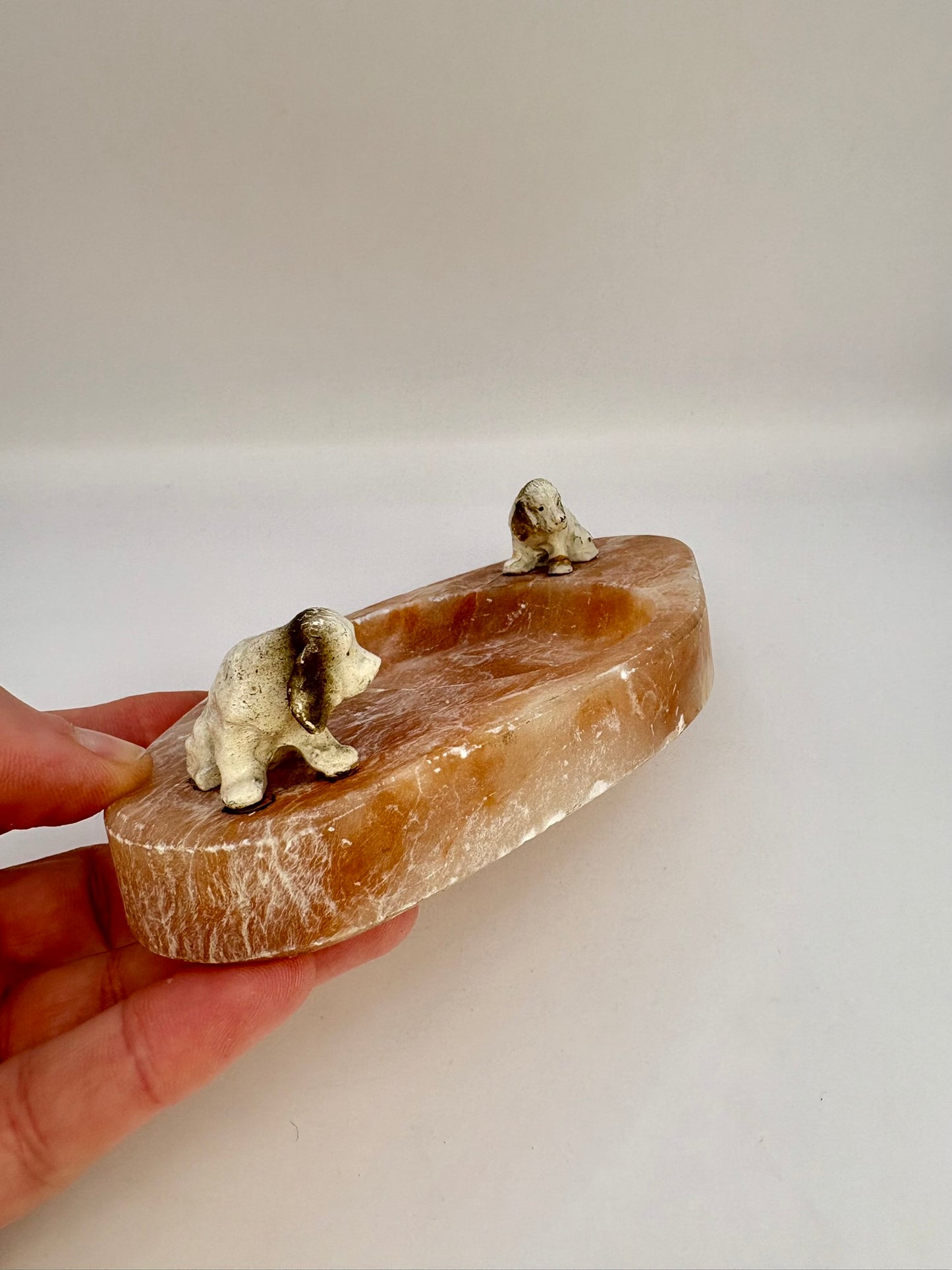 Vintage marble and onyx trinket dish with two dog figurines from the 1930s