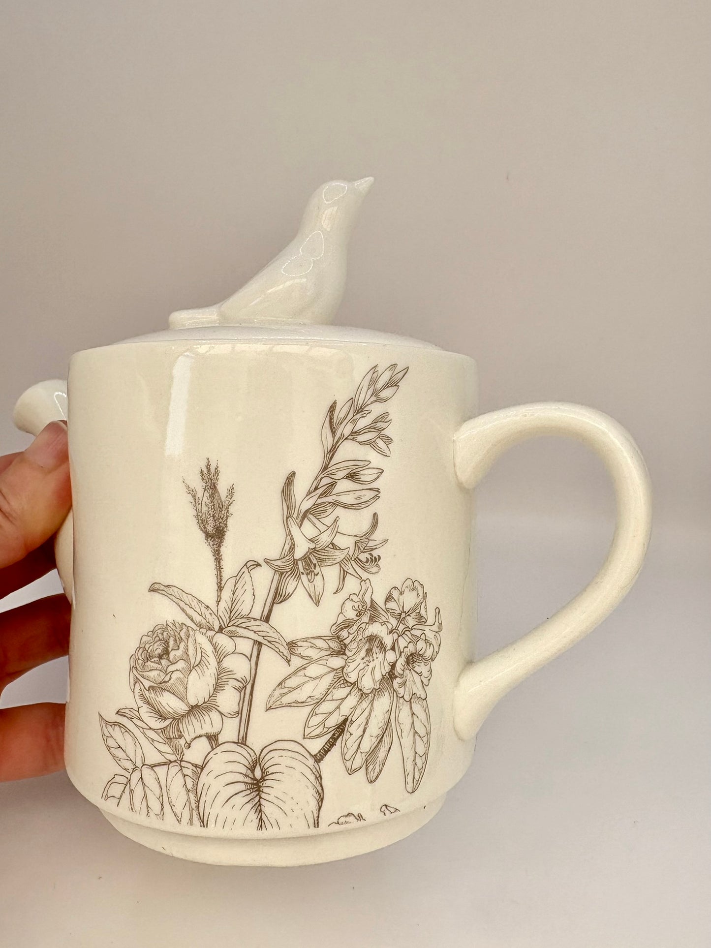 RHS-inspired ceramic teapot with floral and bird design