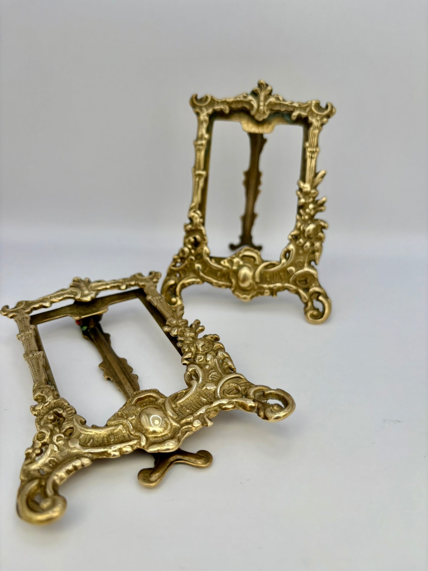 Pair of vintage brass easel stands for displaying pictures or photos