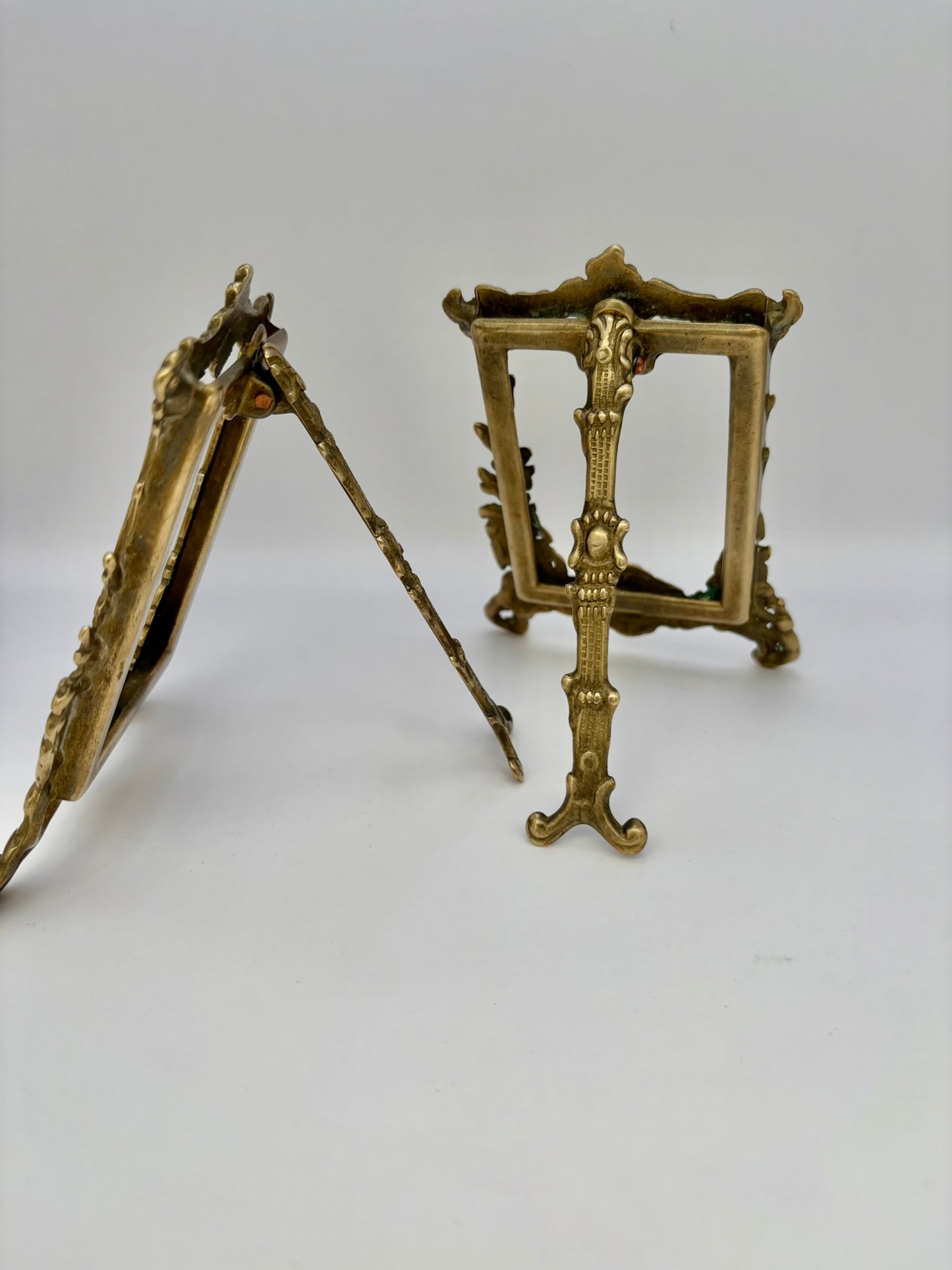 Pair of vintage brass easel stands for displaying pictures or photos