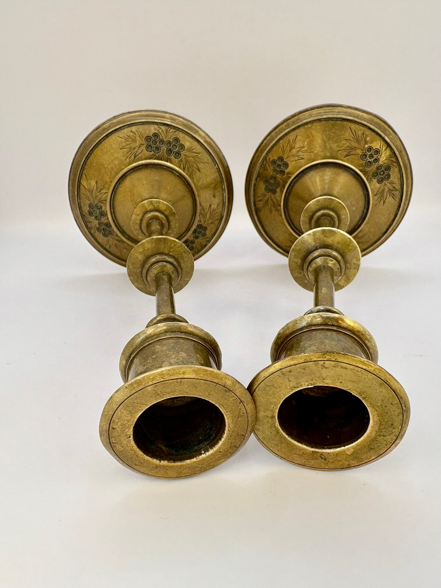 Antique pair of 19th century brass candlesticks with elegant patina