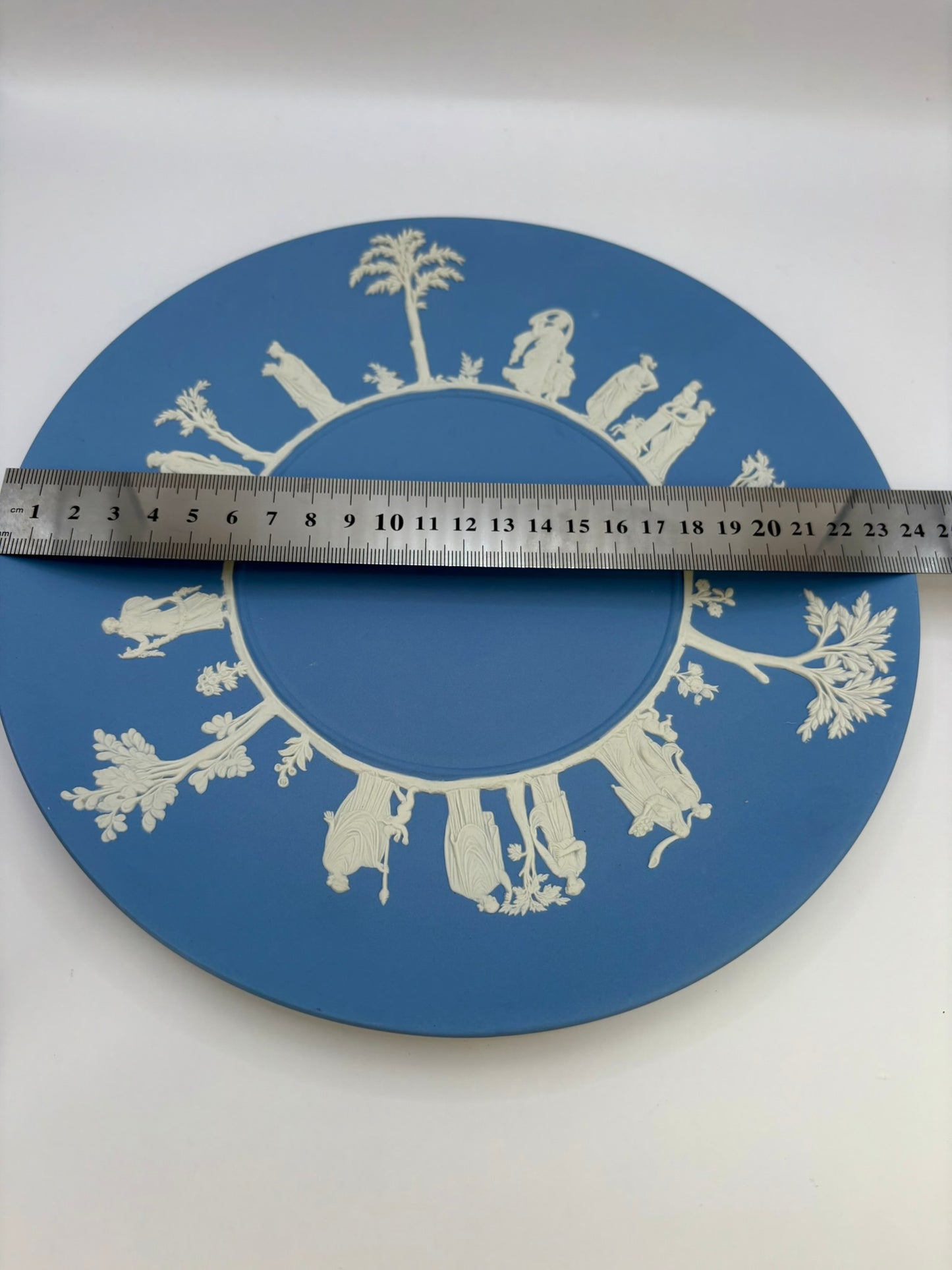 Blue Wedgwood Jasperware plate with neoclassical white relief detail