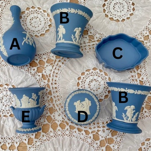 Collection of blue ceramic items with white patterns on
