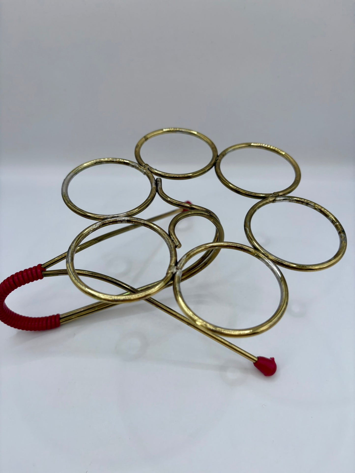 Set of six vintage shot glasses with original 1960s metal cradle
