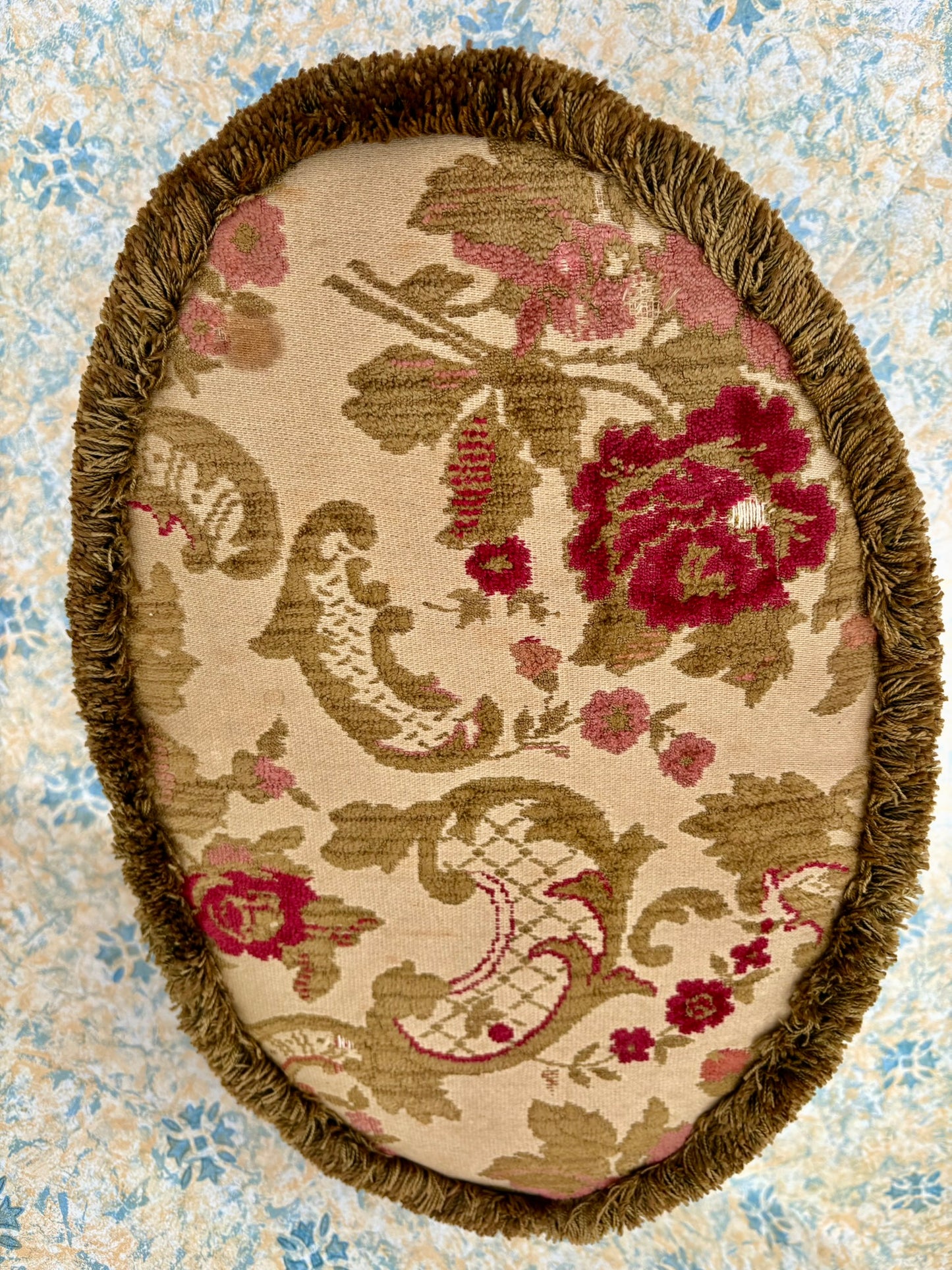 Vintage mid century upholstered wooden foot stool with tapestry sides, tassels and brown velvet top