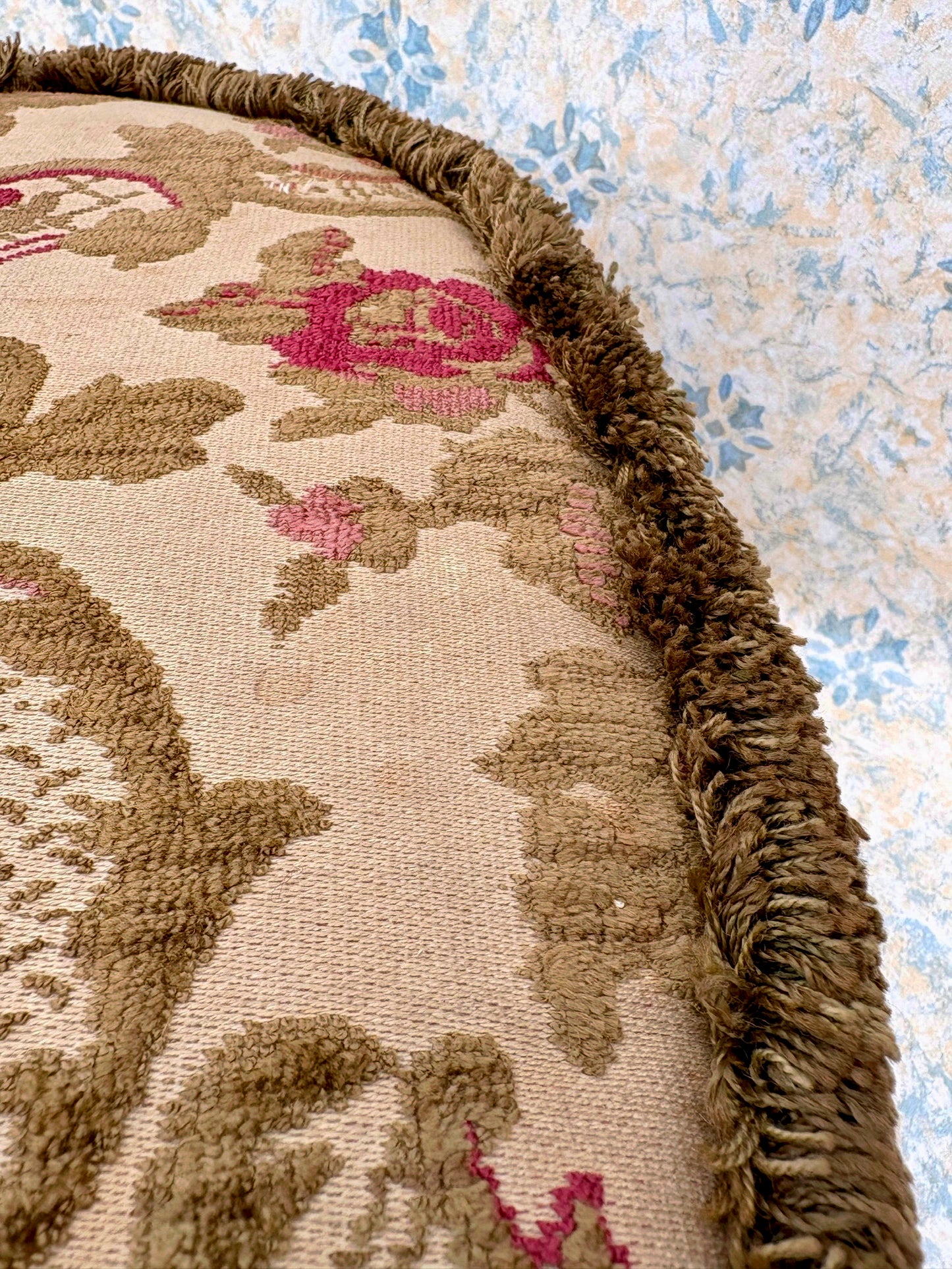 Vintage mid century upholstered wooden foot stool with tapestry sides, tassels and brown velvet top