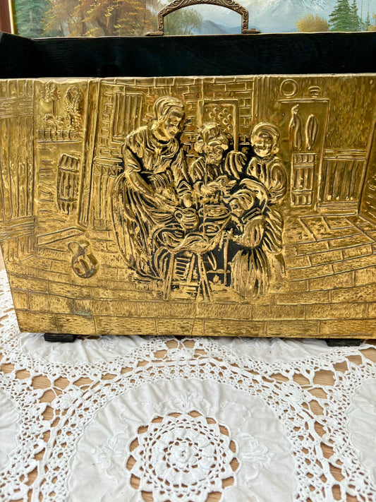 Vintage embossed brass magazine rack featuring a 1960s tavern scene