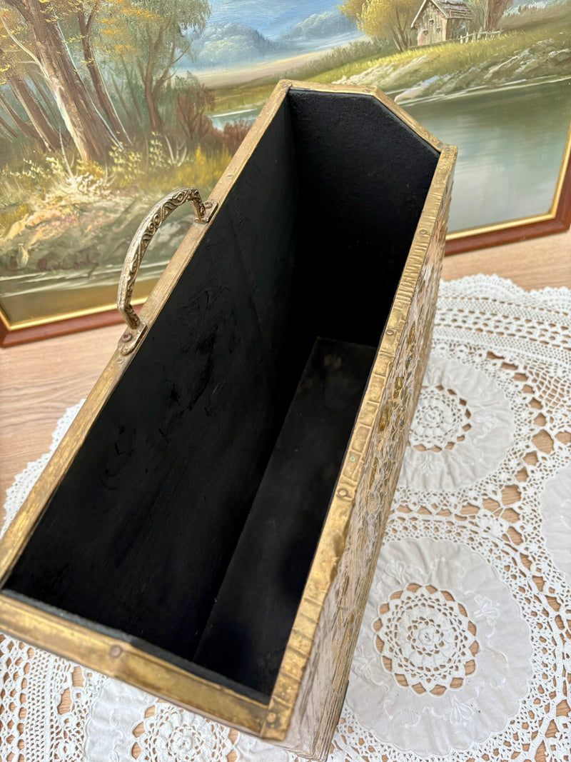 Vintage embossed brass magazine rack featuring a 1960s tavern scene