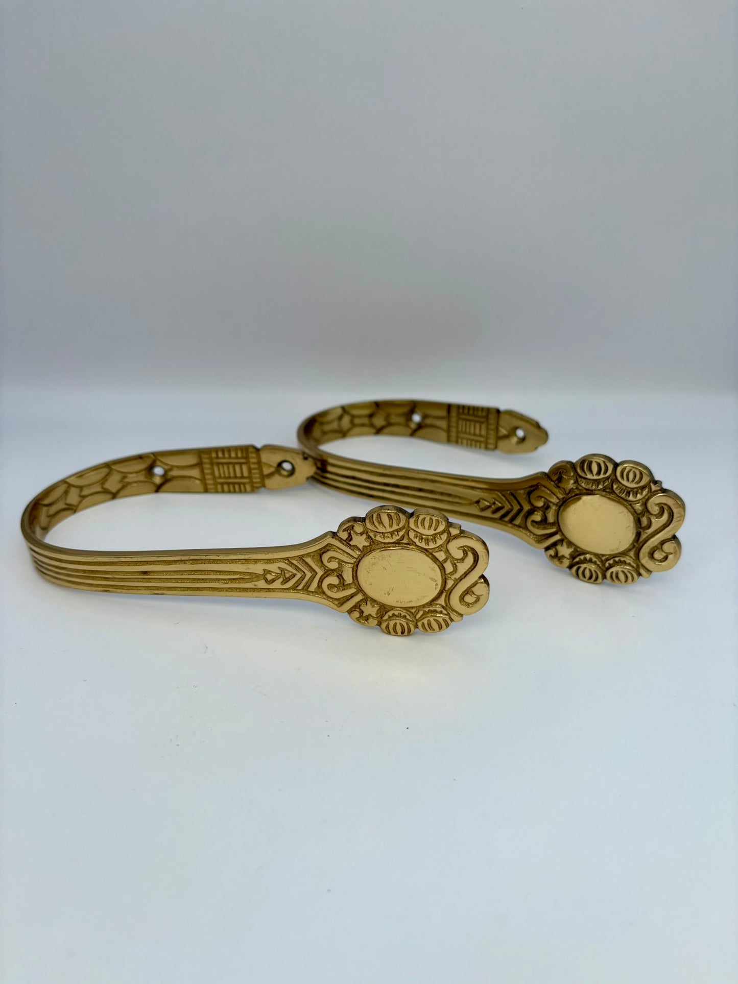 Solid brass curtain hardware set with vintage-style rods and finials