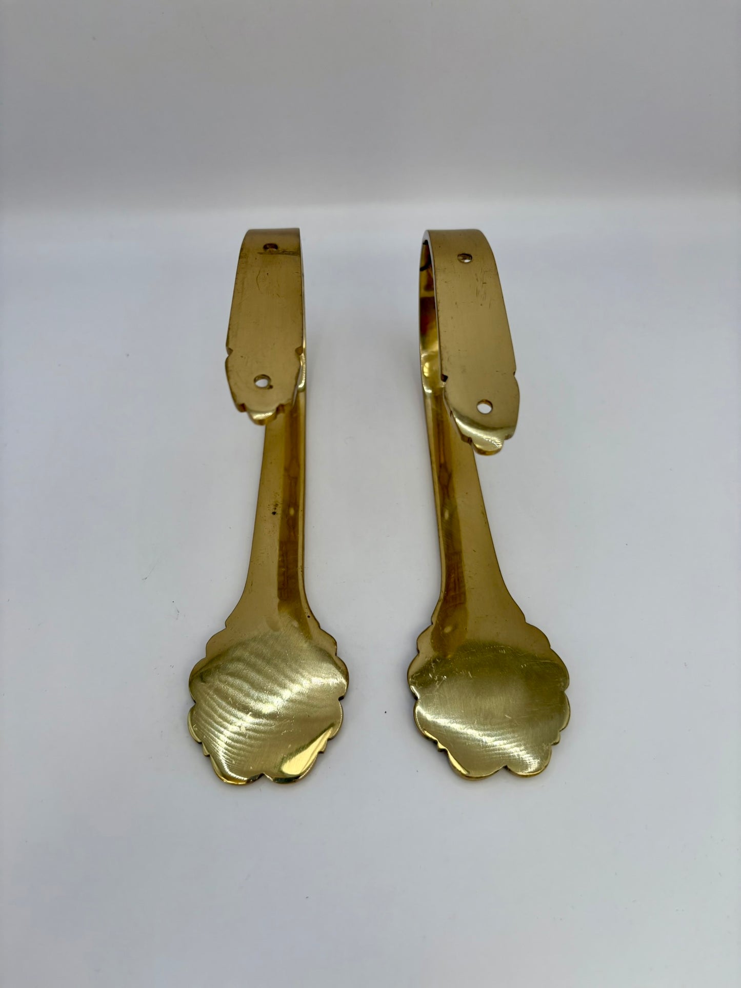 Solid brass curtain hardware set with vintage-style rods and finials