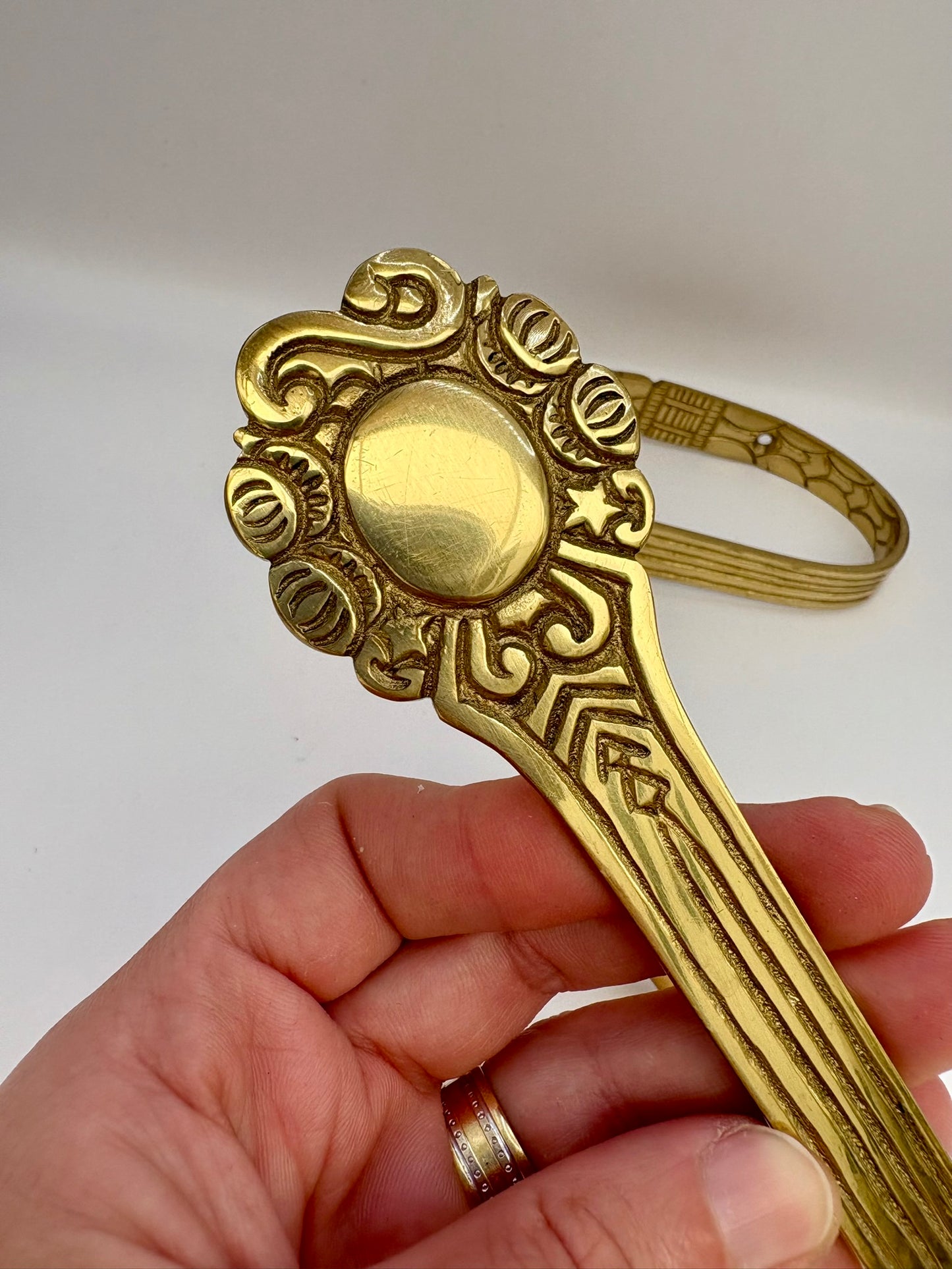 Solid brass curtain hardware set with vintage-style rods and finials