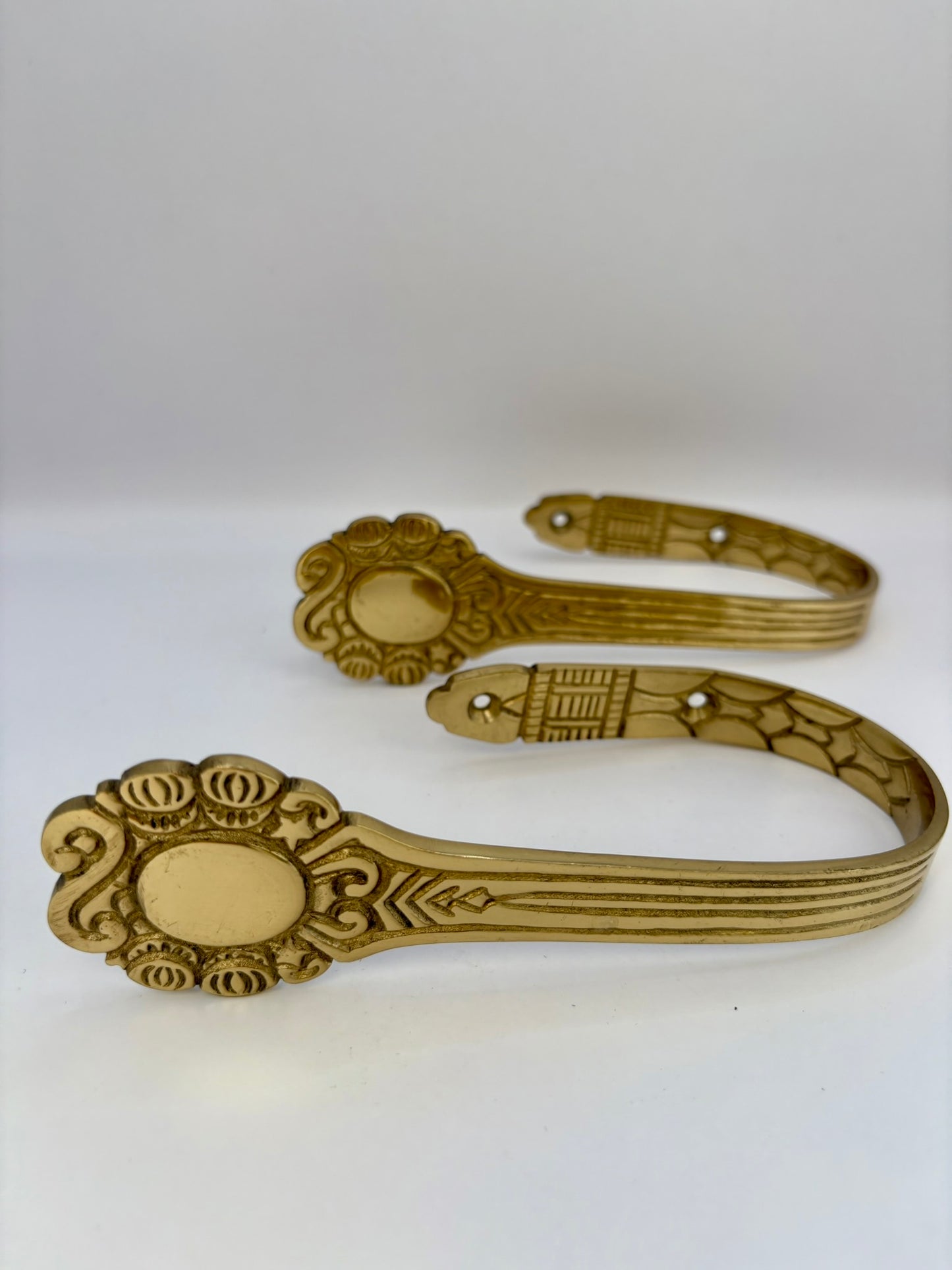 Solid brass curtain hardware set with vintage-style rods and finials