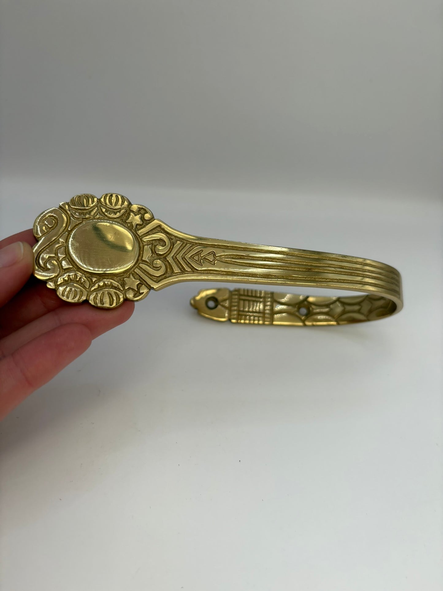 Solid brass curtain hardware set with vintage-style rods and finials