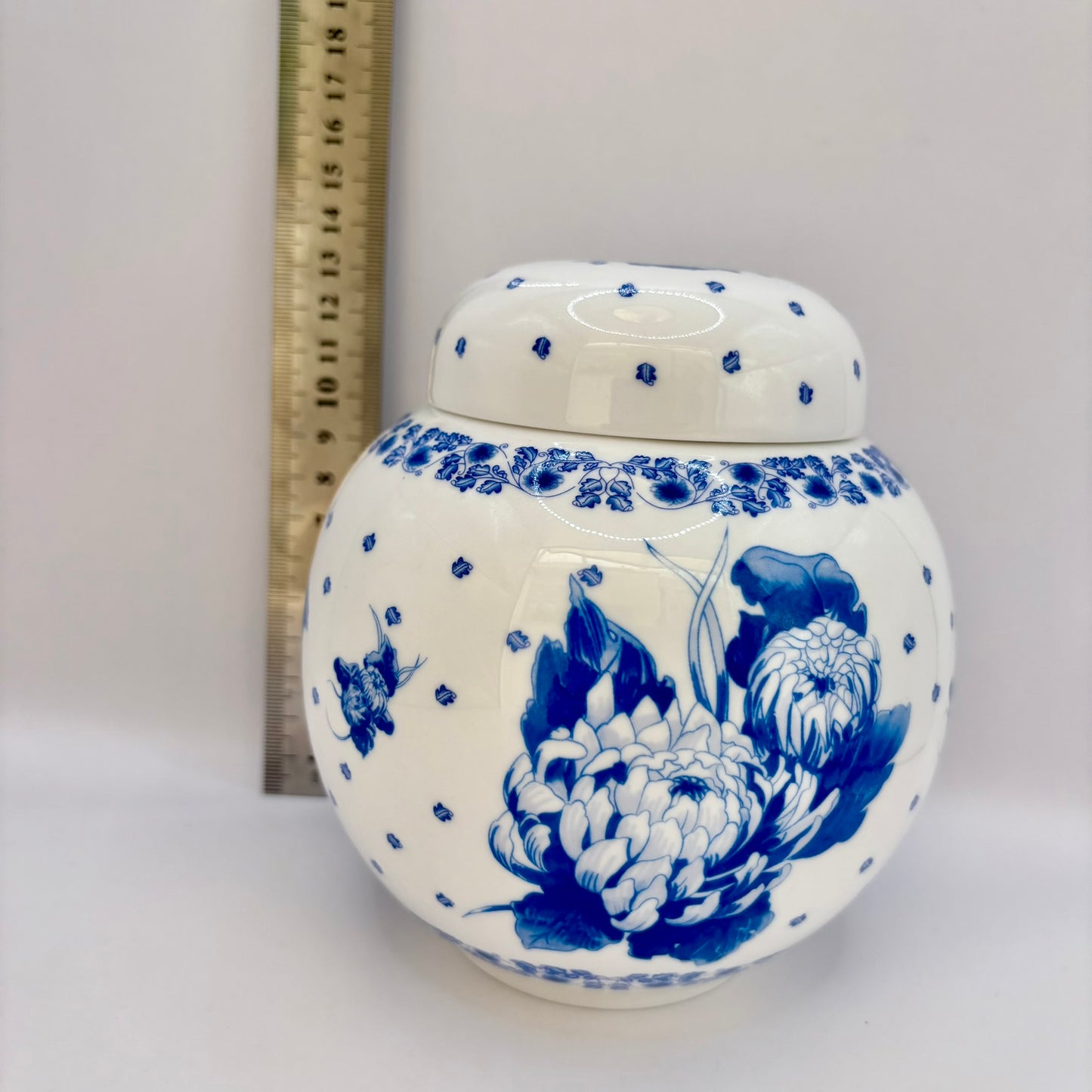 Vintage Ringtons bone china ginger jar with blue and white chrysanthemum design and lid