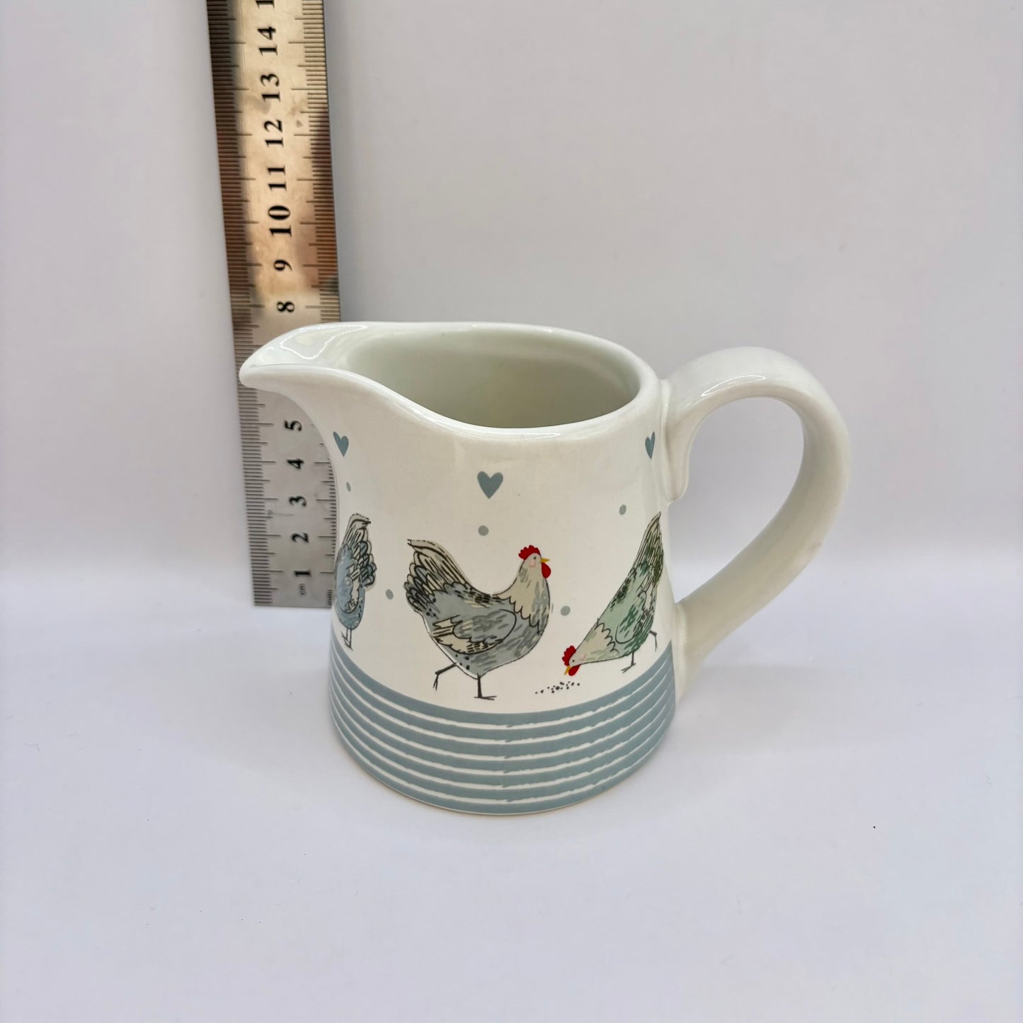 Blue striped Gisela Graham country cottage jug with hen design
