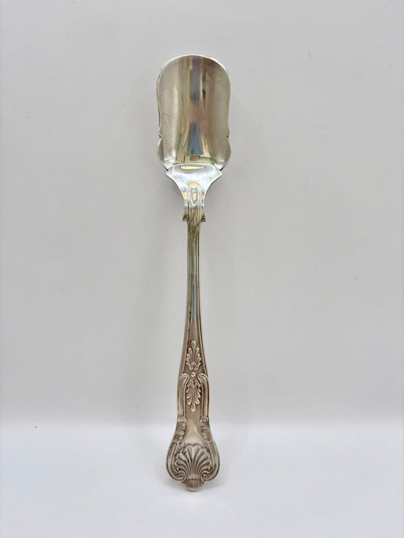 Silver spoon with detailed handle on a white background