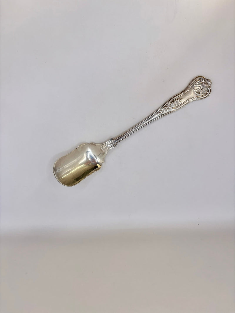Silver spoon on a white background
