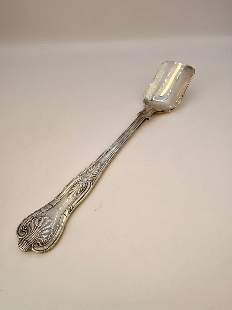 Silver spoon on a white background