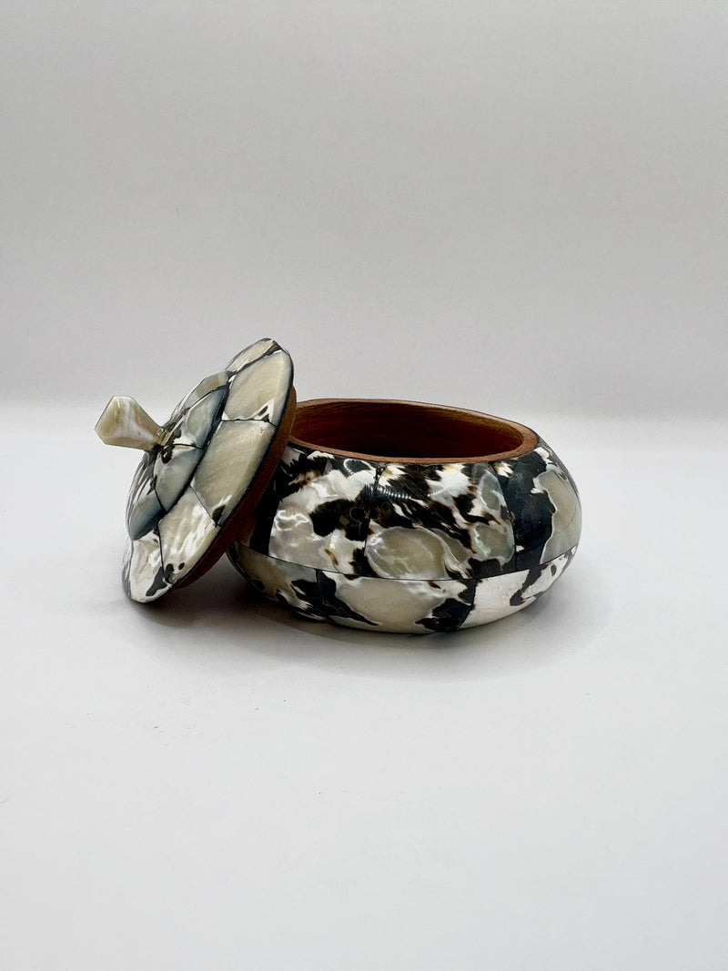 Marble-patterned jewelry box with a lid on a white background