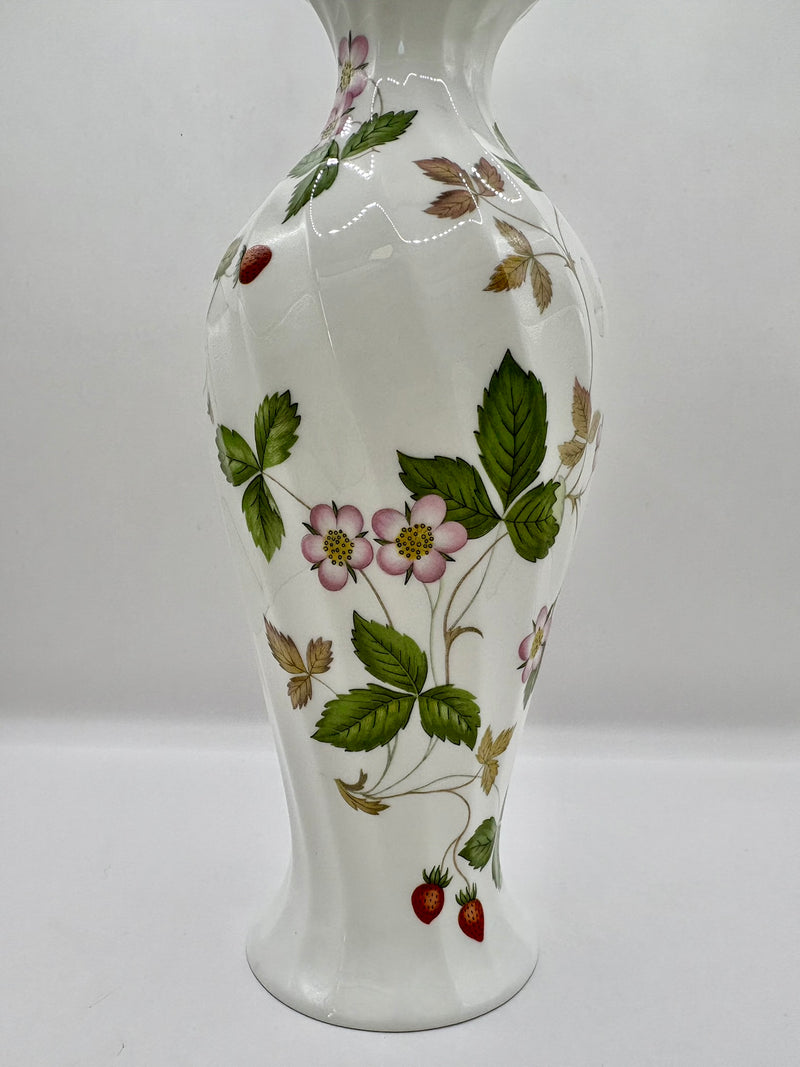 Vase with floral design on a white background