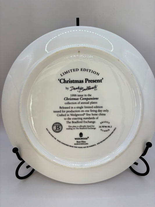 White decorative plate with black text on a white background