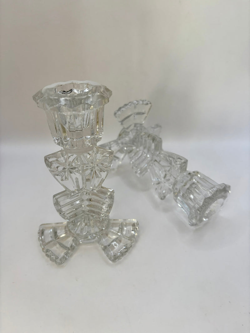 Clear glass candle holder on a white background
