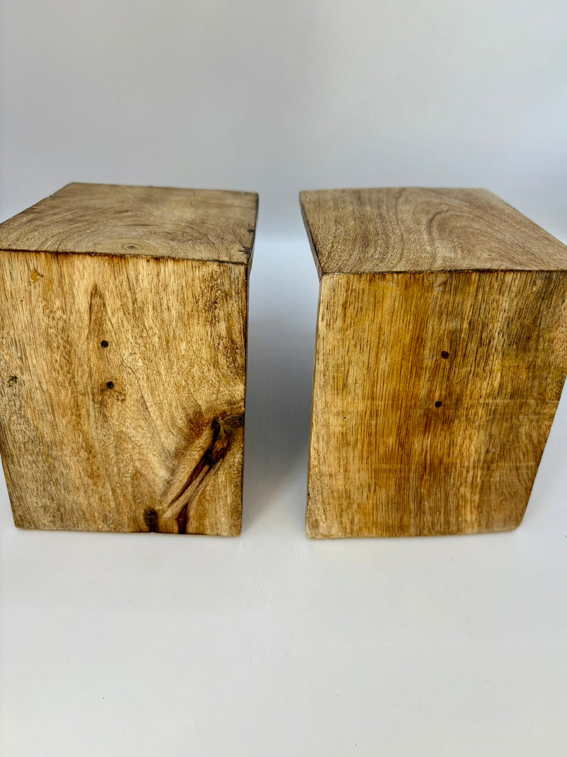 Two wooden blocks on a white background