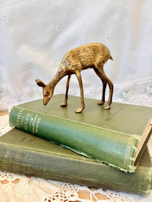 Solid brass doe figurine grazing vintage collectible sculpture