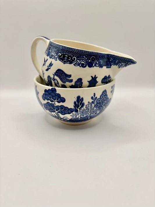 Set of two blue and white ceramic bowls on a light gray background
