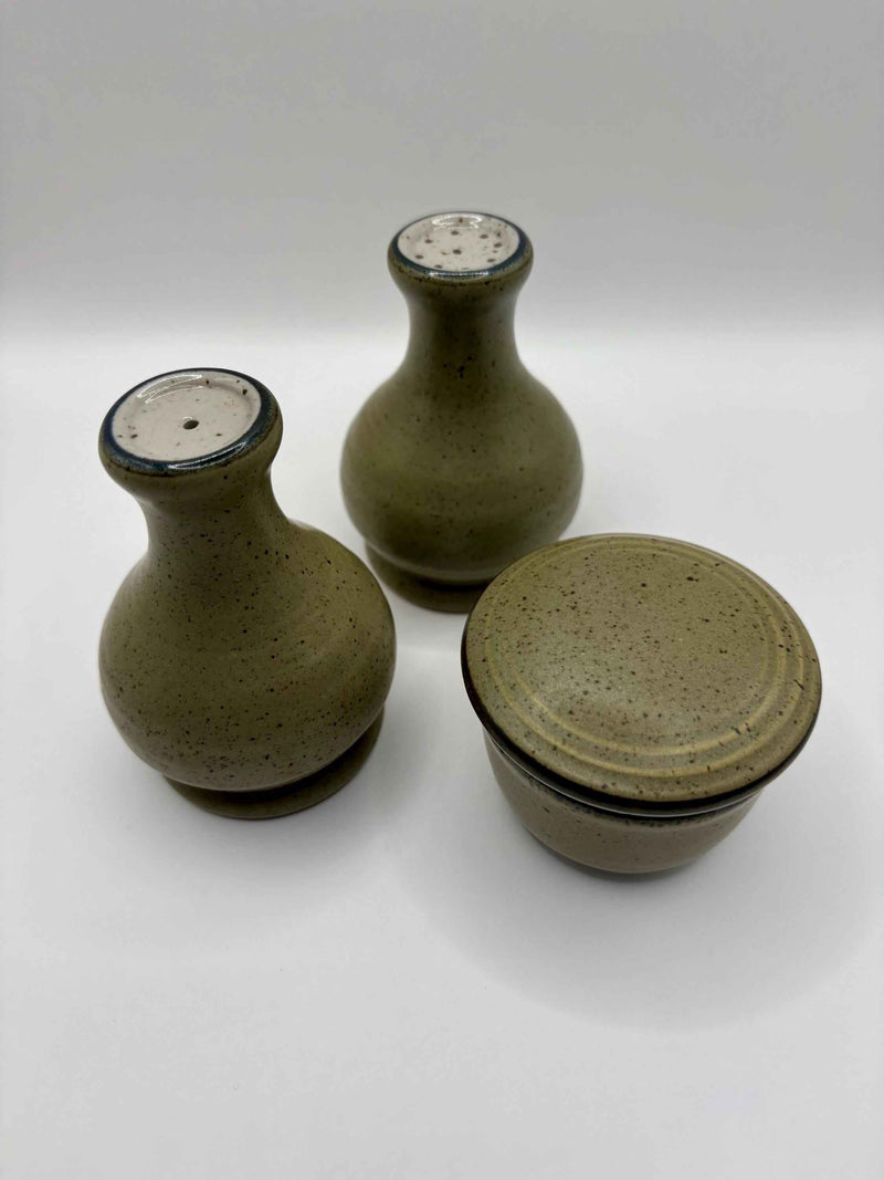 Salt and Pepper shakers with a bowl From Purbeck Pottery Studland