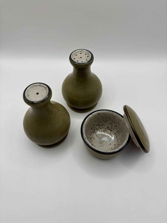 Salt and Pepper shakers with a bowl From Purbeck Pottery Studland