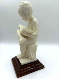 Alabaster Sculpture Of Child Reading A Book