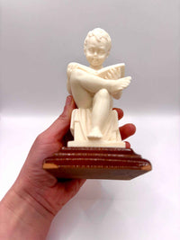 Alabaster Sculpture Of Child Reading A Book