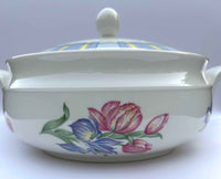 Ceramic dish with floral design on a white background