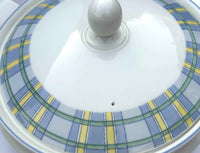 Ceramic dish with a plaid pattern and white lid