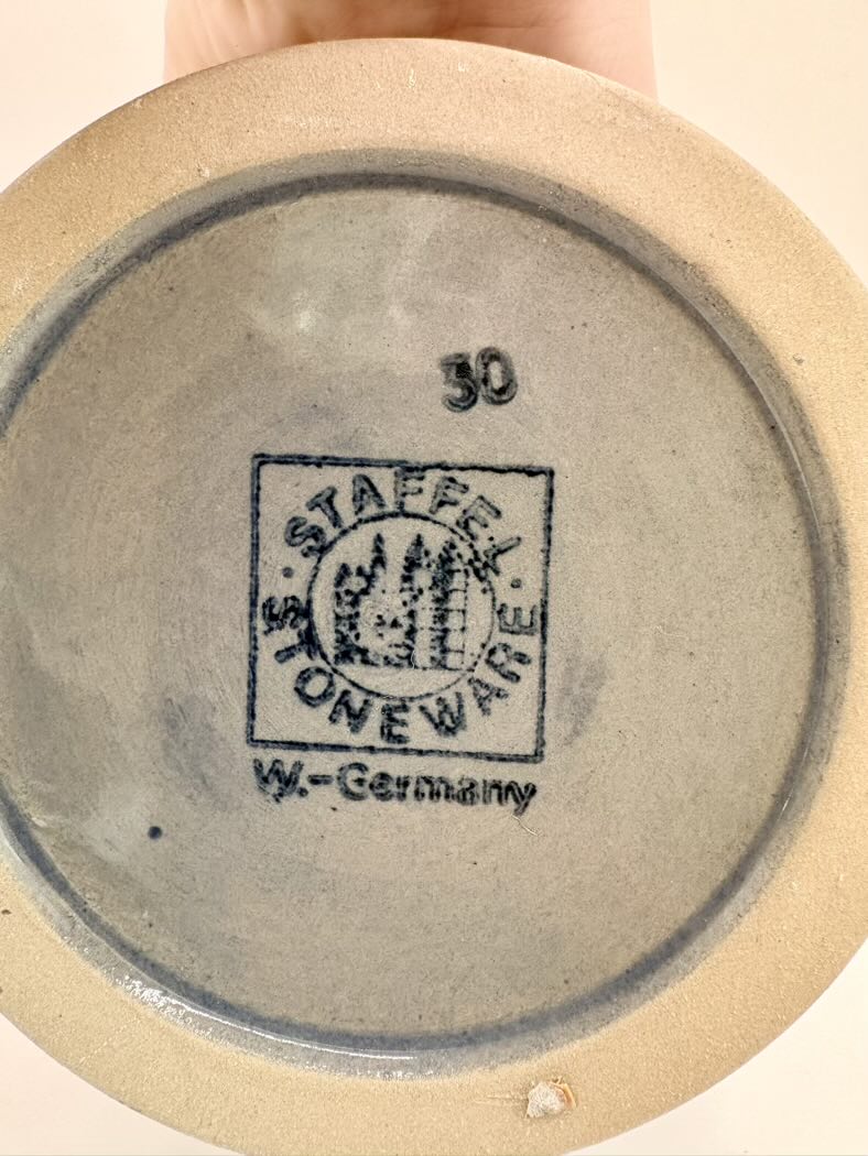 Stoneware product with 'Staffelton Ware W.-Germany' branding on a beige background