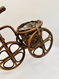Decorative bicycle with a basket on a white background