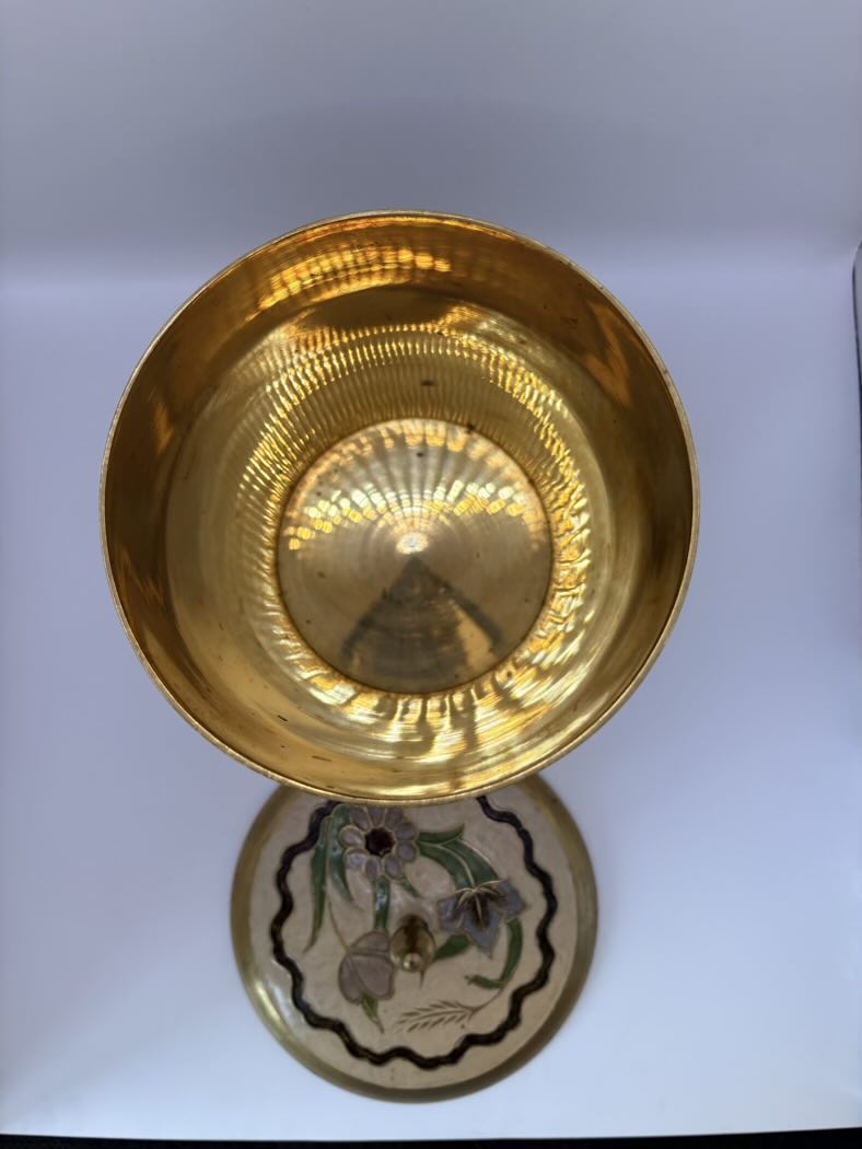 Gold bowl on a white background