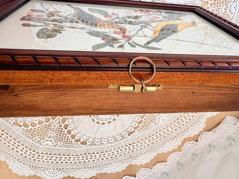Wooden keys box with floral design and lace fabric underneath