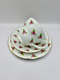 Teacup and saucer set with floral design on a white background