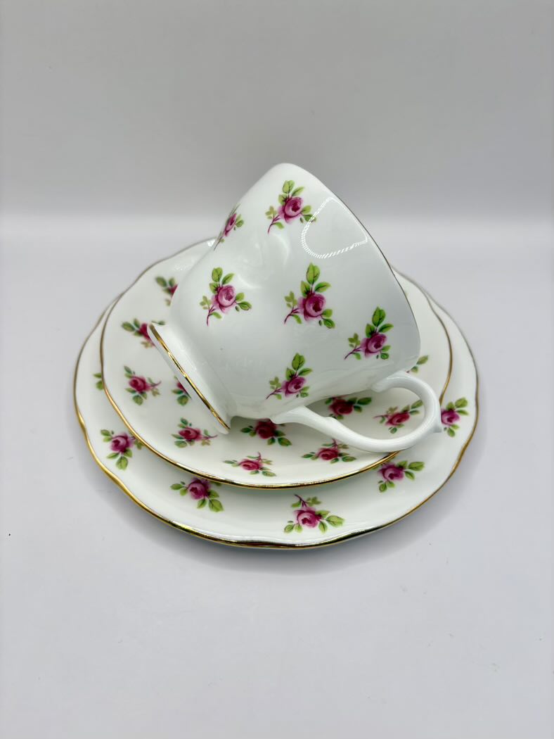 Teacup and saucer set with floral design on a white background