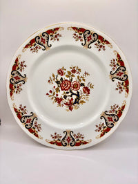 Decorative plate with floral pattern on a white background