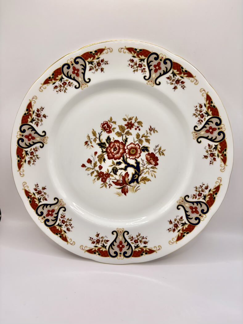 Decorative plate with floral pattern on a white background