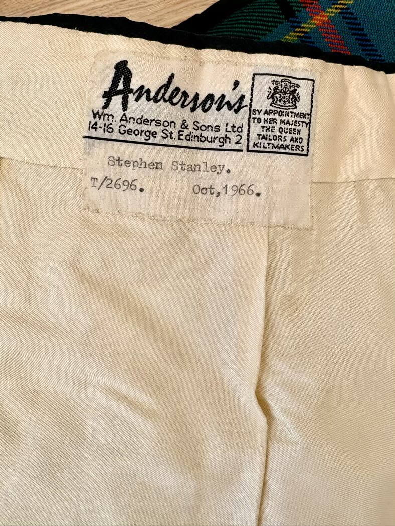 Label on a garment with 'Wm. Anderson & Sons' branding and text.
