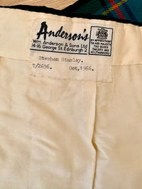 Label on a garment with 'Wm. Anderson & Sons' branding and text.