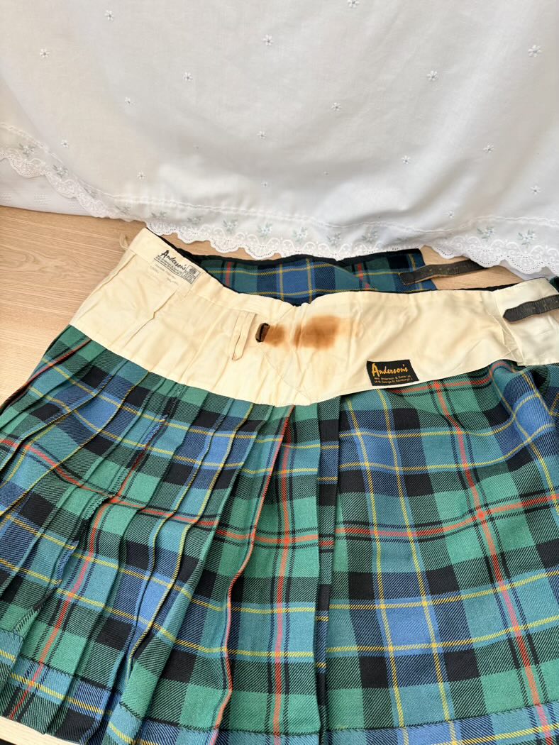 Plaid skirt with a visible brand label on a white background