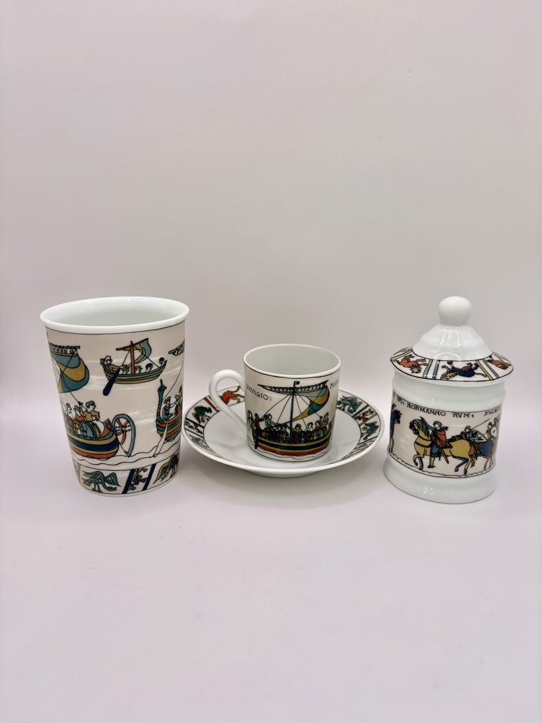 Ceramic set with cup, saucer, and jar on a light gray background