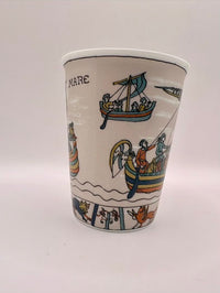 Ceramic cup with decorative boats