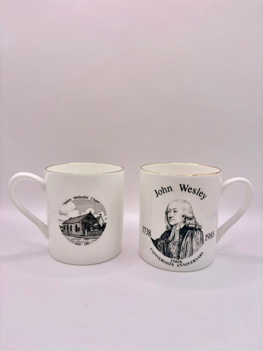 Two mugs with printed designs on a white background